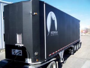 Using 22-ounce Shelter-Rite fabric by the Seaman Corp., TRS Industries Inc. wrapped this trailer around the outside to create a less wind resistant trailer, as well as protecting it from road sand and gravel. Photo: TRS Industries Inc. 